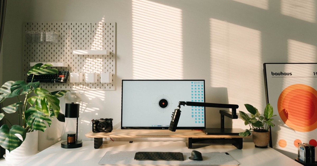 A minimalist, professional office workspace, representing CAP standards of practice for email and digital communication in Alberta