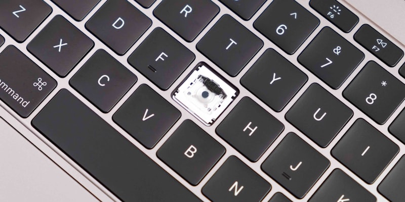 Close up of a laptop keyboard with a security chip, representing what to look for in an encryption solution