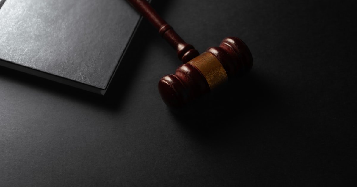 Gavel and law book representing regulatory retention requirements for Ontario therapists